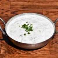 Yogurt Dip · Yogurt blended with topped cucumber. Served with pita bread. Gluten free and vegetarian.