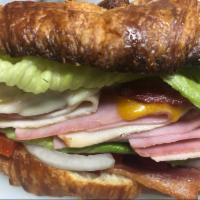 Towne Club  · Ham, Turkey and Bacon with cheddar and swiss