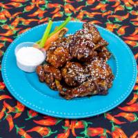 Chicken Wings · 1 dozen naked and fried wings tossed in sauce of your choice. Served with celery. Add extra ...