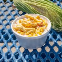 Esquite · Corn in a cup with mayo, cheese, butter, and chili powder if requested. 