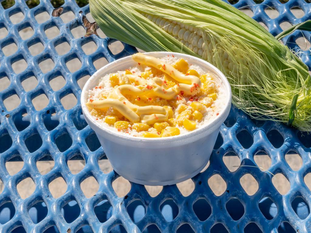 Esquite · Corn in a cup with mayo, cheese, butter, and chili powder if requested. 
