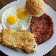 Ham Steak  & Eggs · Thick-cut ham steak served with Jezebel sauce, two eggs your way, hash browns or grits, bisc...
