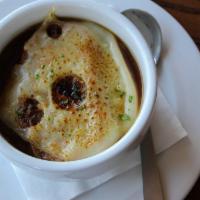 French Onion · Sweet Vidalia caramelized onions simmered in beef au jus, topped with toasted French bread a...