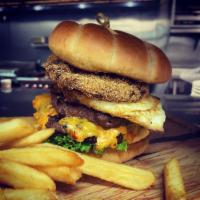 KU Burger · Two all-beef patties, pimento and cheese, fried green tomatoes, comeback sauce, lettuce and ...