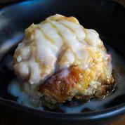 Bread Pudding · White chocolate bread pudding with buttered rum sauce.