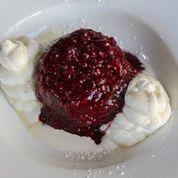 Lava Cake · With raspberry compote, powdered sugar and sweet cream.