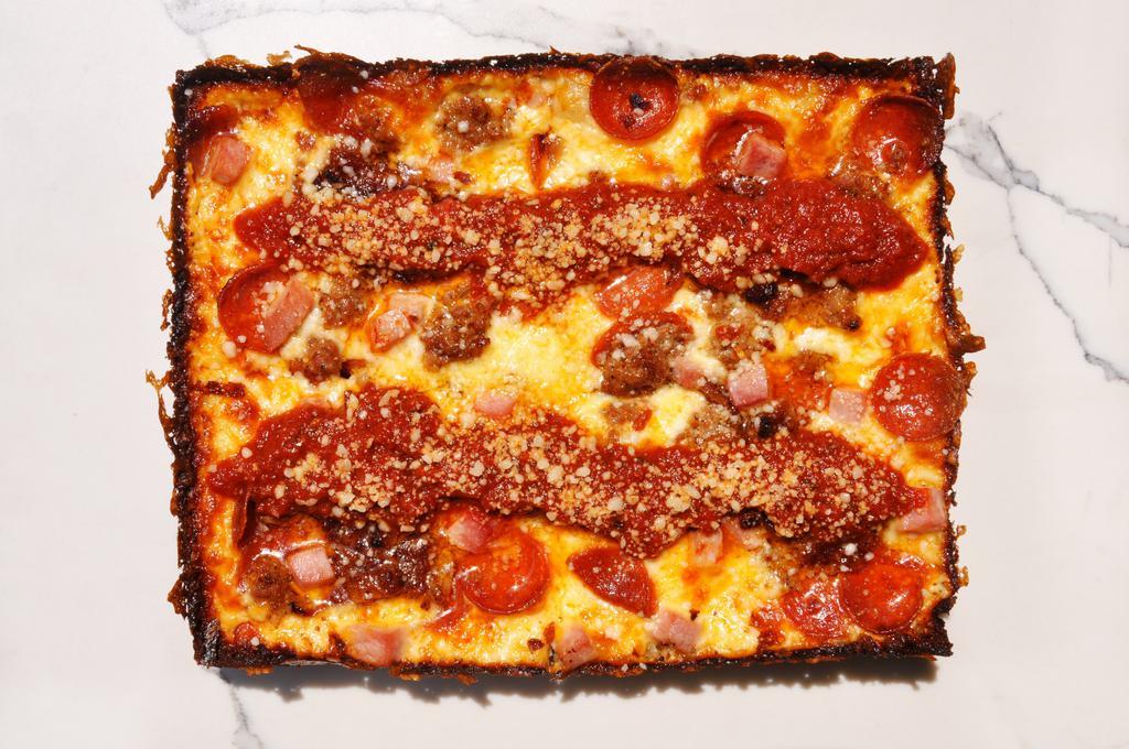 Motown Meat Pizza · Pepperoni, ham, bacon jam, housemade Italian sausage.