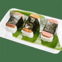Spam Musubi · A block of rice and meat wrapped in flavored dried seaweed.