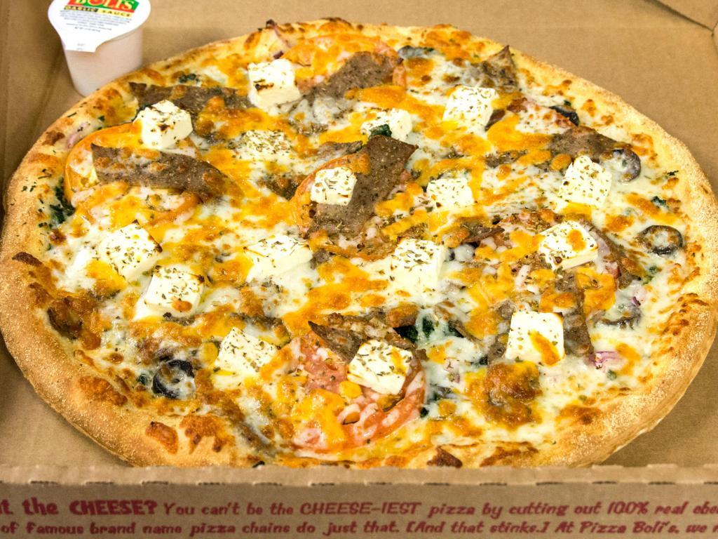 Greek Pizza · Tzatziki sauce, mozzarella, provolone, cheddar cheese, feta, spinach, red onions, tomatoes, black olives and gyro meat.