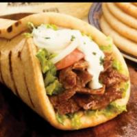 Gyro · Lamb and beef on pita bread, homemade cucumber sauce, onion, tomato and lettuce.