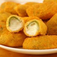 Jalapeno Poppers · jalapeño peppers that have been hollowed out, stuffed with ricotta cheese, breaded and deep ...