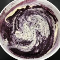 Blueberry Cheesecake · Hand-crafted cheesecake base swirled with fresh a blueberry puree. (Gluten-free)