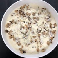 Cookie Dough  · A creamy vanilla ice cream with homemade cookie dough pieces.