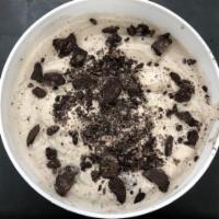 Cookies & Cream Ice Cream · Our sweet cream base infused & mixed with Oreo cookies.