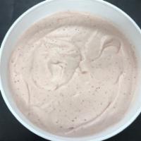 Strawberry Ice Cream · Roasted fresh strawberries melted in our sweet cream base. (Gluten-free)