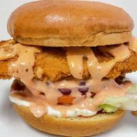 Spicy Flounder Sandwich · Comes with fried flounder, spicy tartar sauce, lettuce, and tomato. 