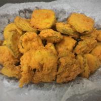 Fried Pickles · Hand breaded and fried to crispy golden perfection. Served with a choice of sauce.
