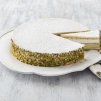 Ricotta Pistachio Cake · Pistachio and ricotta creams separated by sponge cake, decorated with crushed pistachios and...