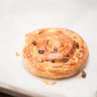 Pain au Raisin · Brioche roll with raisins and sweet pastry cream.