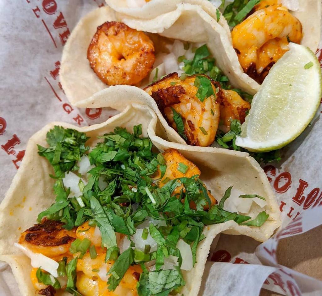 Single Shrimp Taco · One shrimp taco on freshly made corn or flour tortillas with your choice of toppings.