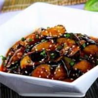 Yu-Shang Eggplant	 · 鱼香茄子
Spicy. Braised eggplant with bold, tart garlic yu-shang sauce