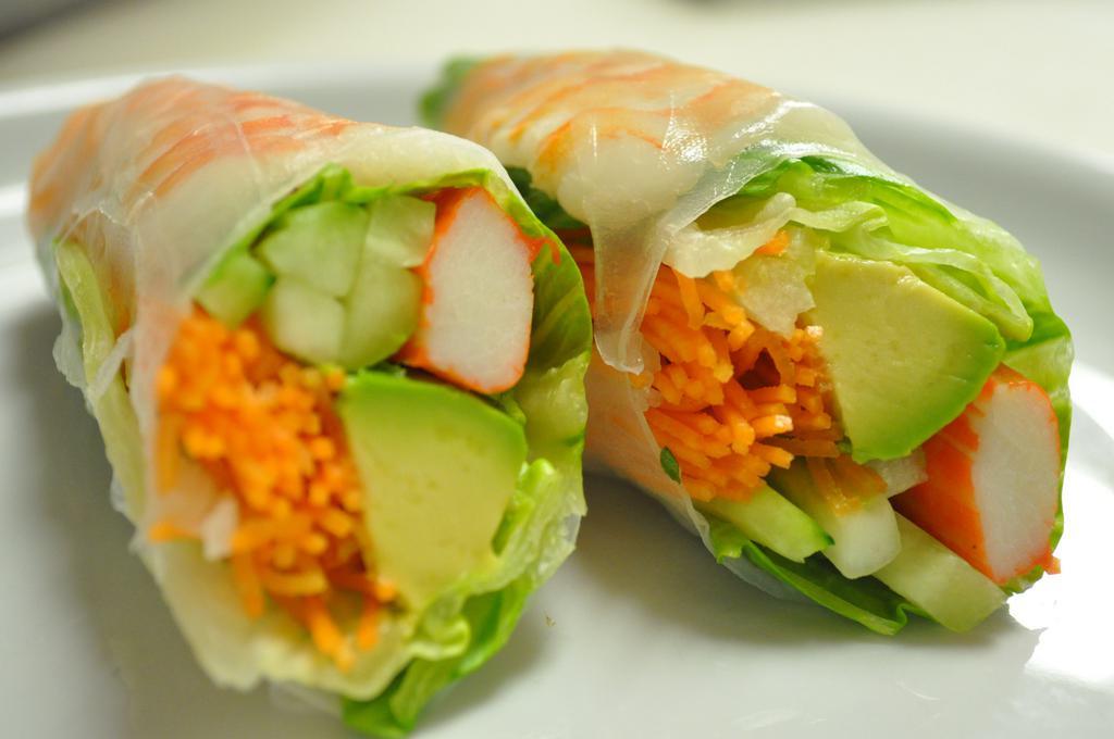Summer Roll · Shrimp, crabstick, avocado, lettuce, carrot and cucumber wrapped in thin rice paper served with sweet chili sauce.