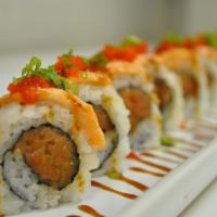 Kaboom Roll · Spicy tuna topped with fresh salmon, baked with spicy masago and scallion.