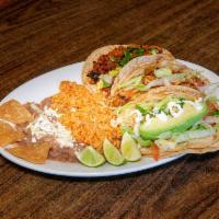 Disco Taco Dinner · Served with rice and beans.Extra topping extra charge