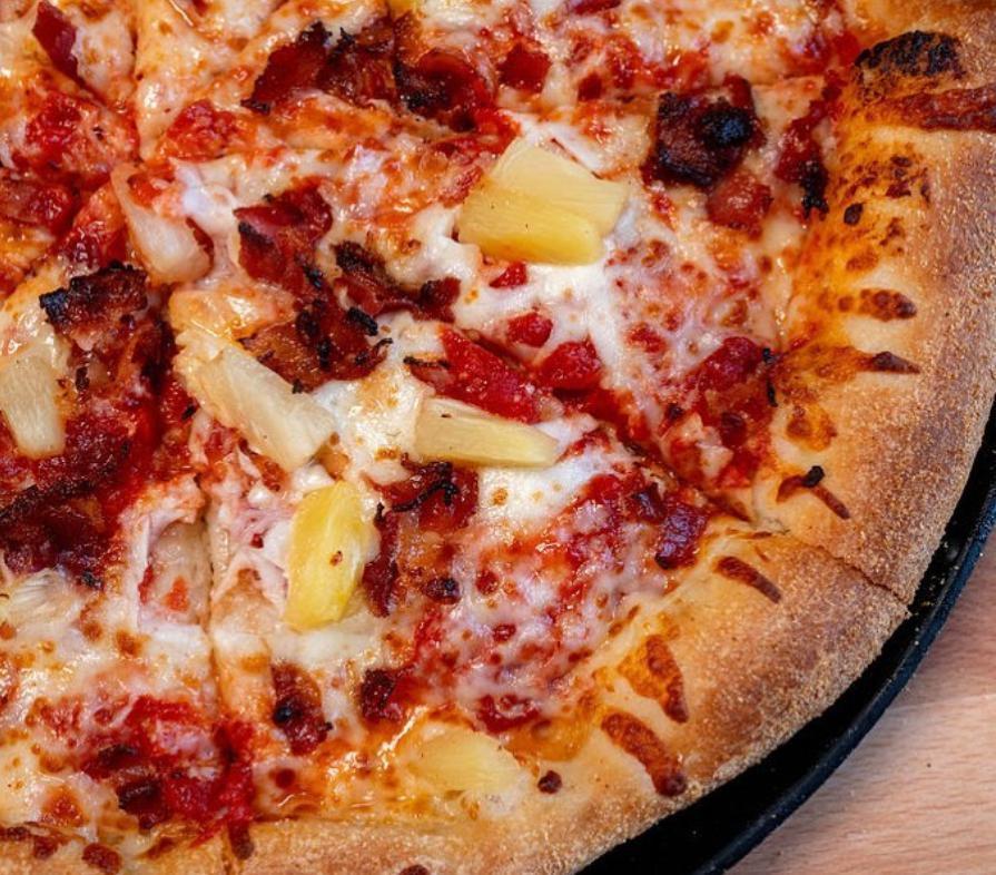 Hawaiian Special Pizza · Italian sauce, BBQ sauce, select blended cheeses, ham, bacon, and pineapple.