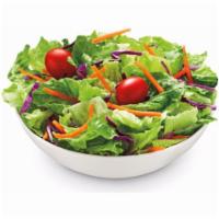 Garden Side Salad · Perfectly sized side salad with crisp romaine, tomatoes, carrots, and onions.