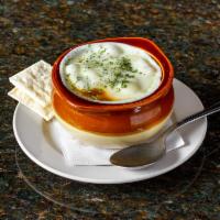 French Onion Soup · Spanish yellow onions, beef stock, topped with provolone cheese and house made croutons. 