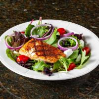Blackened Salmon and Goat Cheese Salad · Fresh mixed greens, spinach, tomatoes, red onions topped with blackened salmon and goat chee...