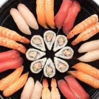 TSUKIJI PLATTER · A combination platter with: California Roll†, Tuna Nigiri*, Yellowtail Nigiri*, Salmon Nigir...