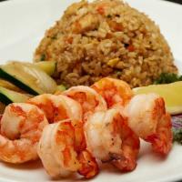 HIBACHI COLOSSAL SHRIMP · Served with hibachi vegetables, “RA”ckin’ Fried Rice and homemade dipping sauces.