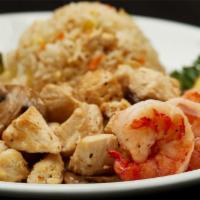HIBACHI CHICKEN & COLOSSAL SHRIMP · Served with hibachi vegetables, “RA”ckin’ Fried Rice and homemade dipping sauces.