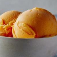 Mango Sorbet · We blended juicy, tropical mangos into a smooth puree to create a refreshing treat with swee...