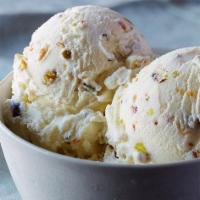 Pistachio Ice Cream · Its exotic flavor is the hallmark of this remarkable dessert. roasted pistachio nuts gently ...