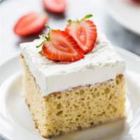 Tres Leches Cake · House-made Mexican style light, airy sponge cake soaked with a mixture of three milks: evapo...