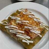 Suizas Enchiladas · Corn tortilla, roasted chicken, jalapeño-chile serrano green salsa, cream cheese, chihuahua ...