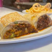 Chorizo Burrito · Housemade chorizo, potatoes, , red Mexican rice, refried pinto beans, chihuahua cheese, guac...