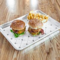 Duo Box · Two 3oz Burgers with Roma tomato, leaf lettuce, shaved onions, pickles, your choice of bun, ...