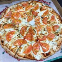 White Knight Pizza · Mozzarella, ricotta cheese, fresh tomatoes, garlic and oregano.