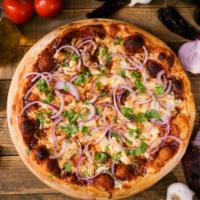 BBQ Chicken Pizza · Mozzarella, BBQ sauce, chicken breast, red onions and cilantro.
