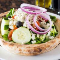 Gorgonzola Salad · Field green lettuce, gorgonzola cheese, red onions, black olives, cucumber and tomatoes serv...