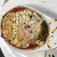 Cheese Ravioli · Stuffed with ricotta, topped with tomato sauce and mozzarella cheese.