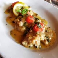 Piccata · Sauteed with capers in lemon white wine sauce. Served with a side of spaghetti.