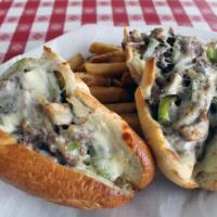 Philly Cheesesteak Sandwich · Ribeye, mozzarella, onions, mushrooms and green peppers. 