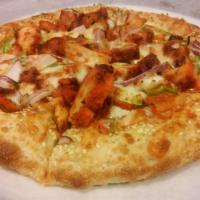 Tandoori Chicken Pizza · Sesame seed crust, marinated chicken, mozzarella cheese, red onions and green peppers. Spicy.