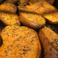 Smoked Sweet Potato · Large sweet potato hickory smoked for 4 hours, seasoned with olive oil, salt, and pepper. Se...