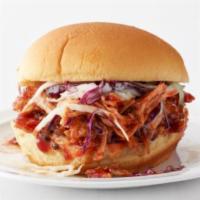 Spicy Pulled Pork Sandwich · Slow Roasted Pork Loin, Habanero BBQ Sauce topped with Coleslaw, Soft Bun. + Side of House m...
